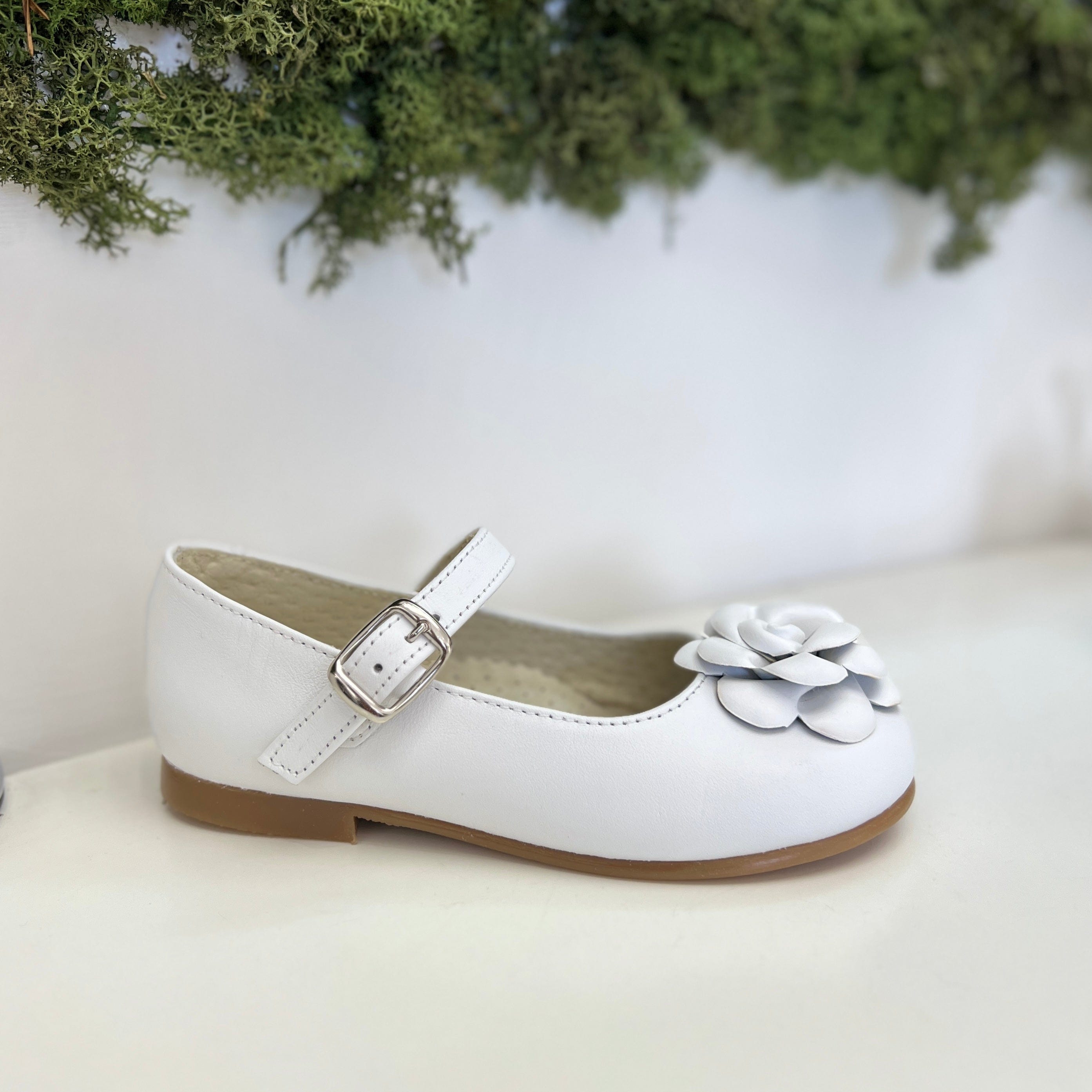 Ballerina con fiore in pelle