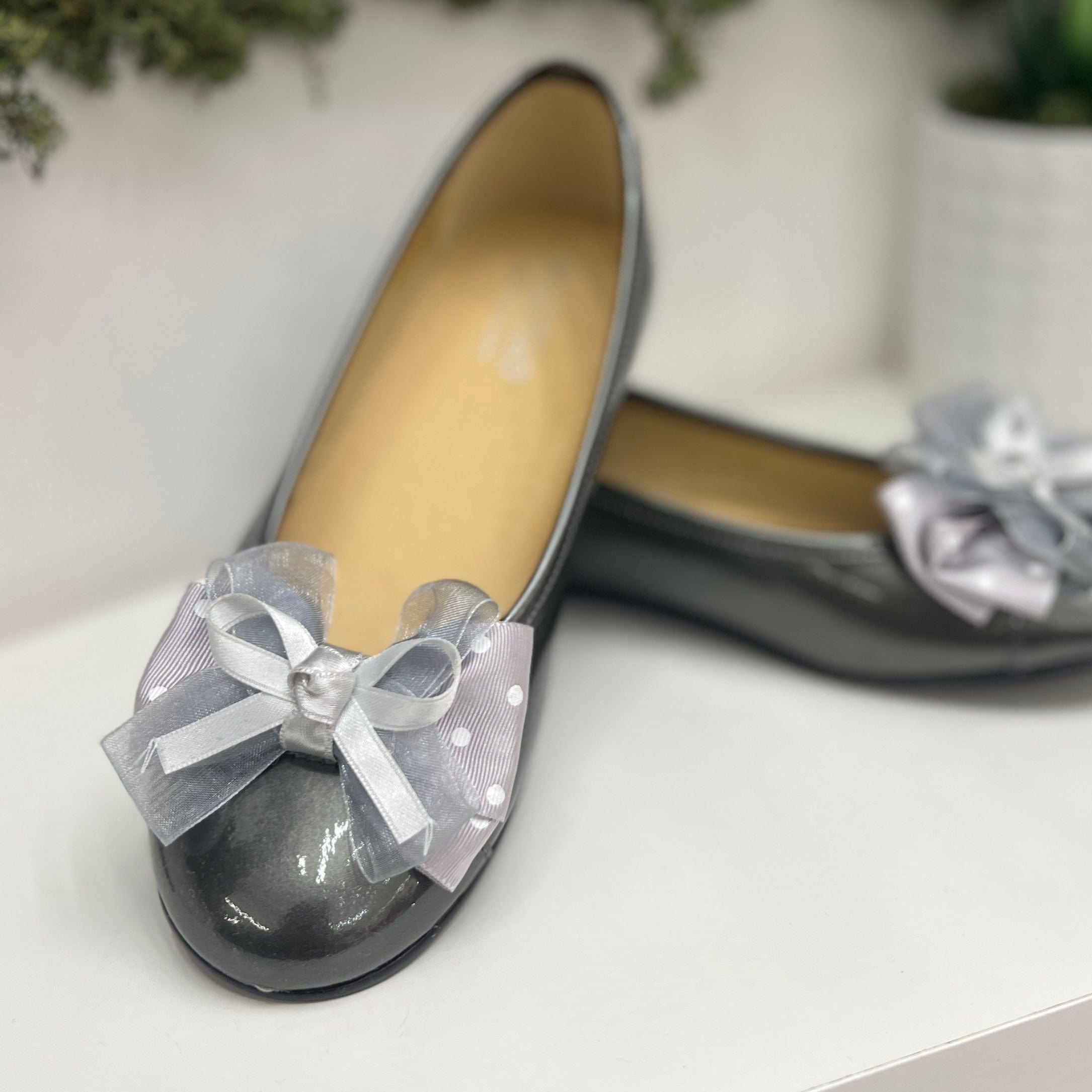 Ballerina metallizzata fiocco