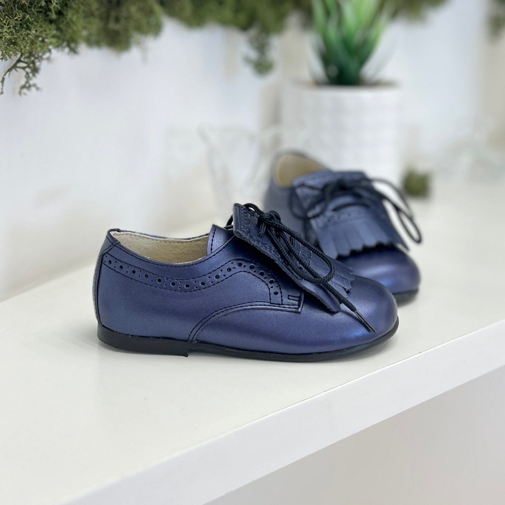 Scarpa perlata con frange