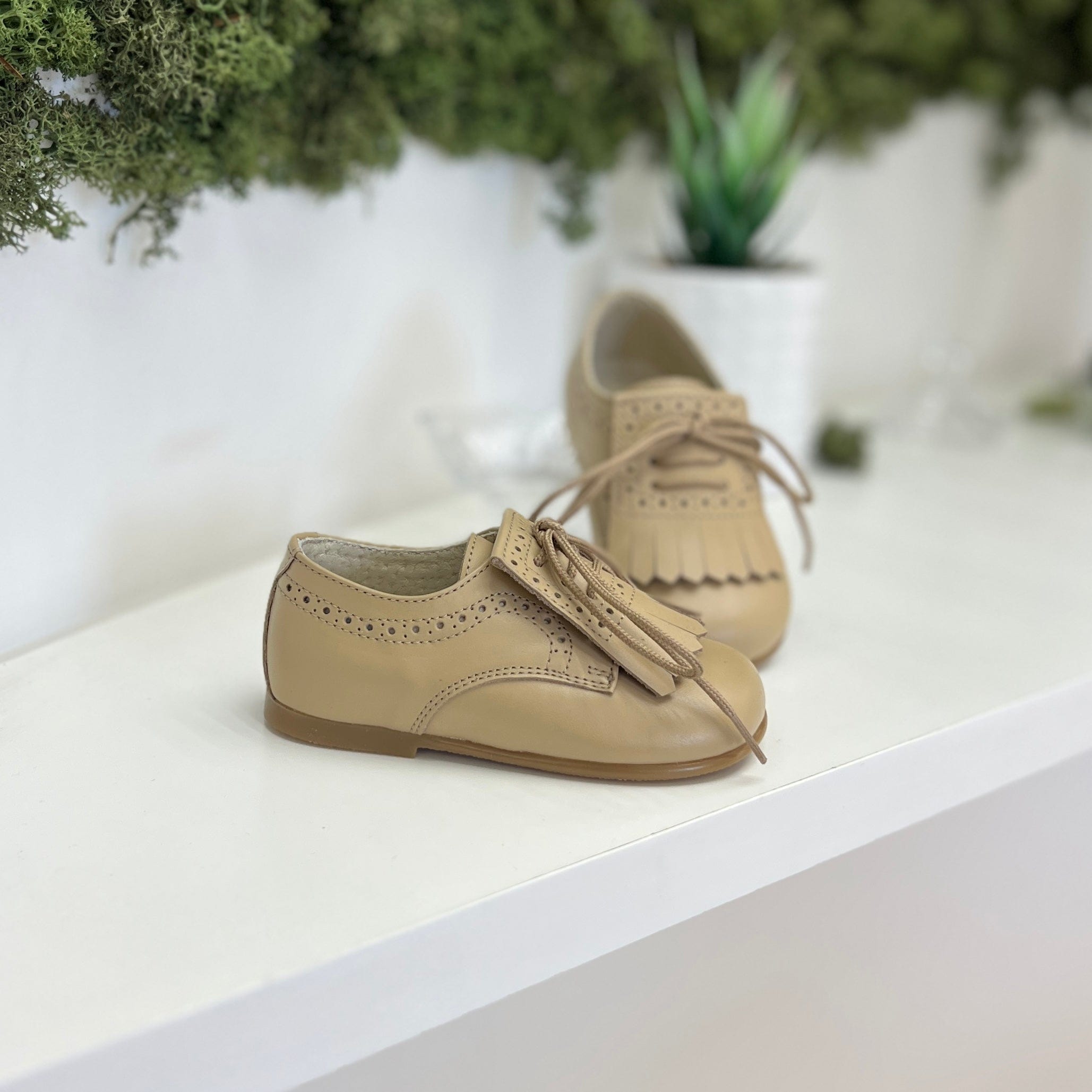 Scarpa elegante con frange