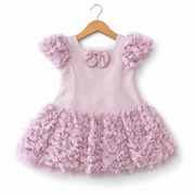 Abito bambina rosa con petali in organza