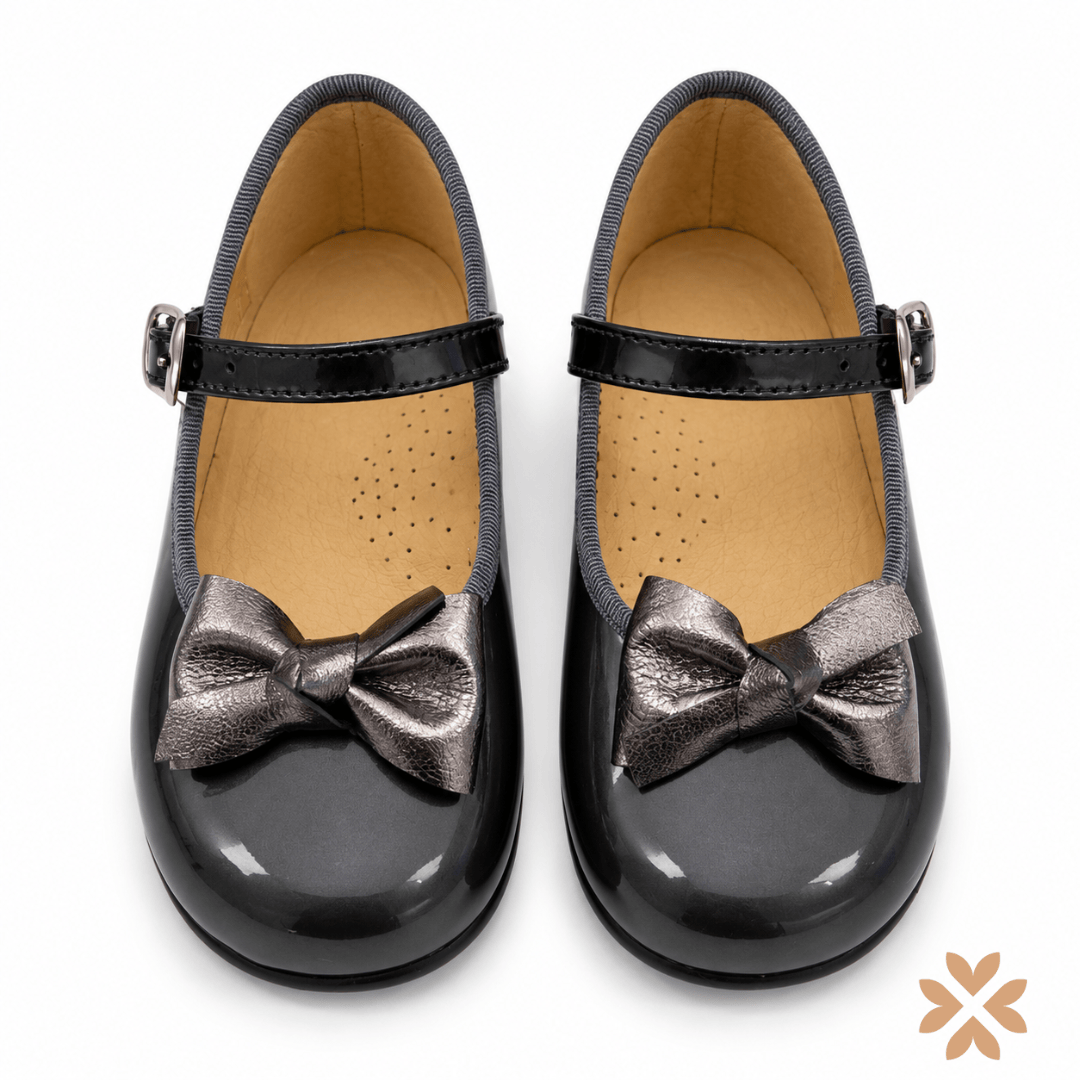 Ballerine in vernice con fiocco