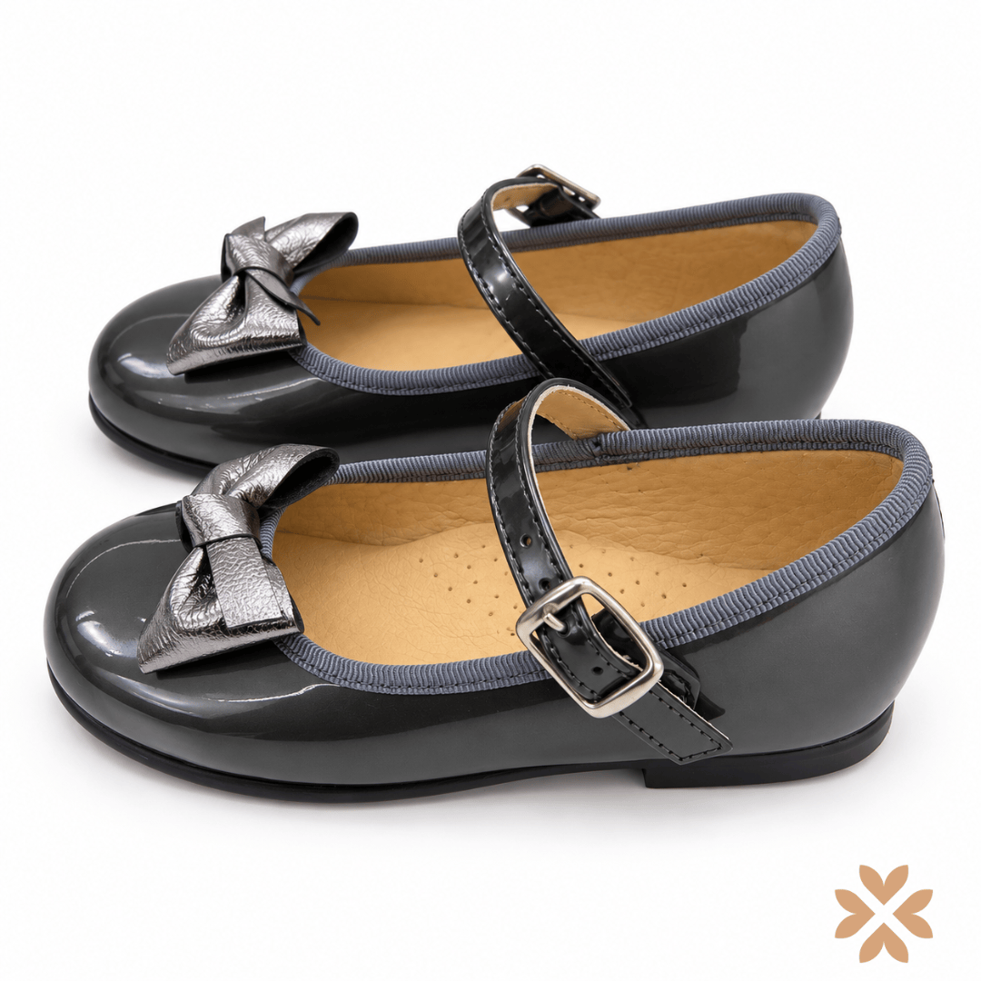 Ballerine in vernice con fiocco
