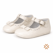 Scarpine culla vernice con fiocco e strass