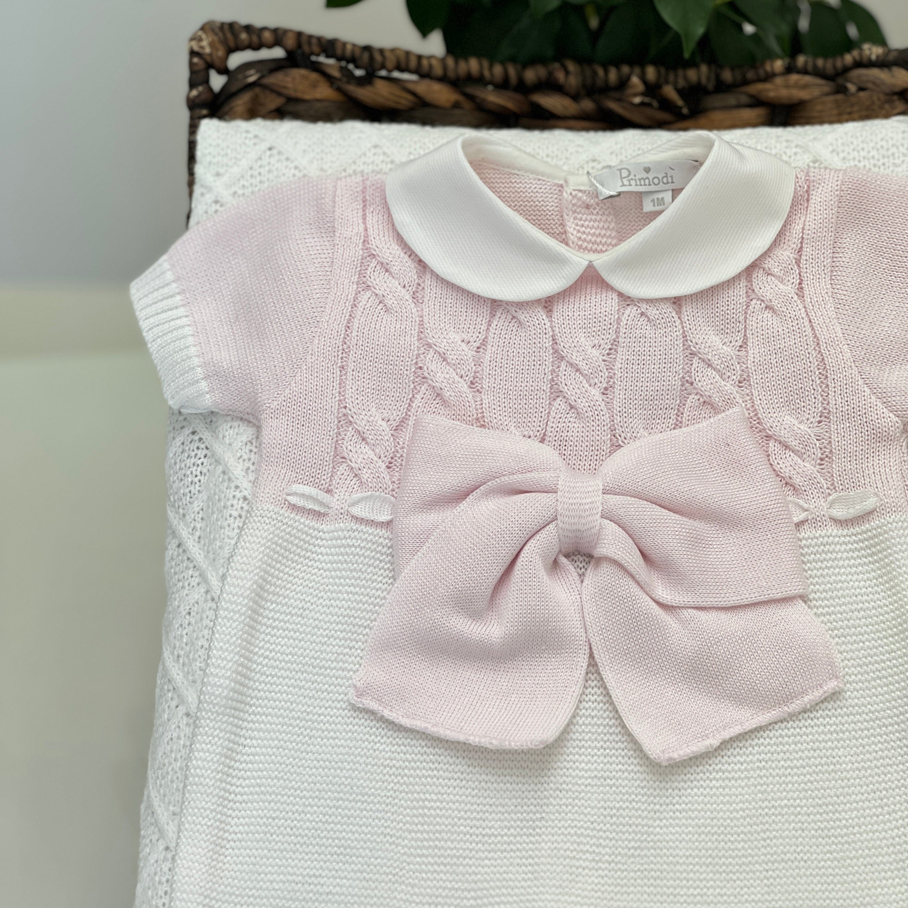 Primodì Bebe - Pagliaccetto in filo con fiocco